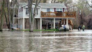 Photo of flood waters rising on a home