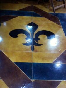 Photo of a decorative fleur-de-lis concrete floor