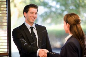 Photo of a Louisville Realtor shaking hands with his client