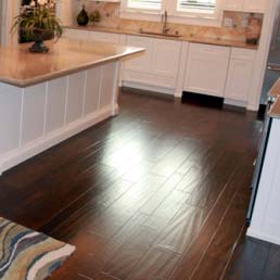 Photo of new, beautiful hardwood floors in a Louisville kitchen.