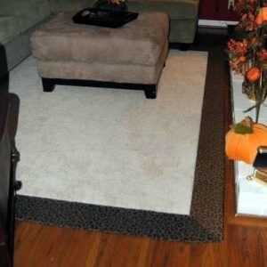 Photo of a rug with snazzy animal print border