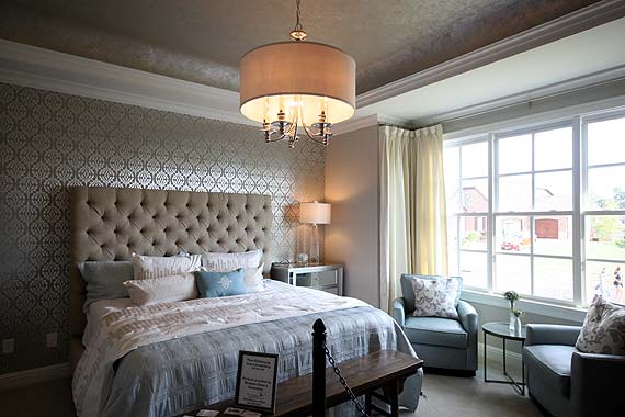 Photo of wallpaper focal wall behind the master bed Rock Springs Homearama