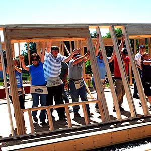 Photo of a Habitat for Humanity crew at work