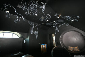 Photo of ceilings constellations painted with fluorescent paint by Tre Pryor