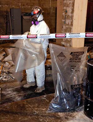 Photo of an asbestos abatement worker.