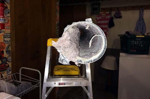 Photo of a dirty dryer vent - 4 Home Maintenance Tasks