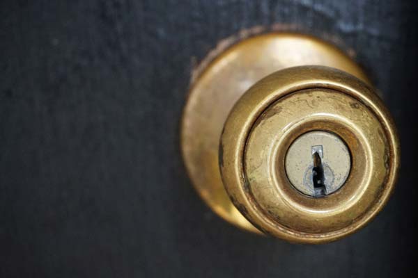 Photo of a knob door handle with lock - Safest Types of Locks for Securing Your Home