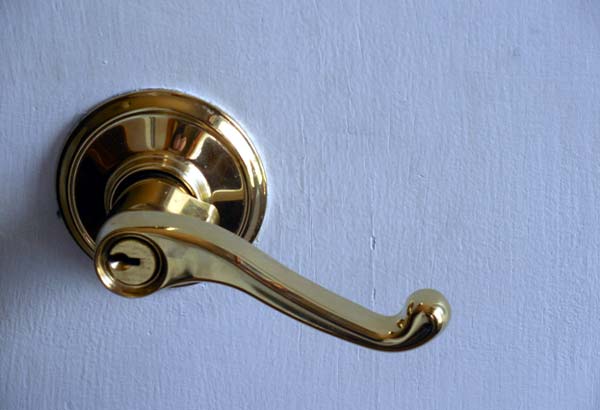Photo of a lever door handle with lock - Safest Types of Locks for Securing Your Home