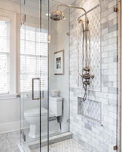 Photo of bathroom with gold centerpiece tile - Shower Tile Ideas