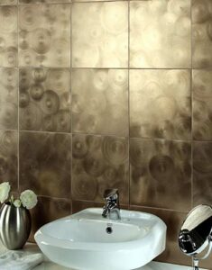 Photo of bathroom with gold metallic tile - Shower Tile Ideas