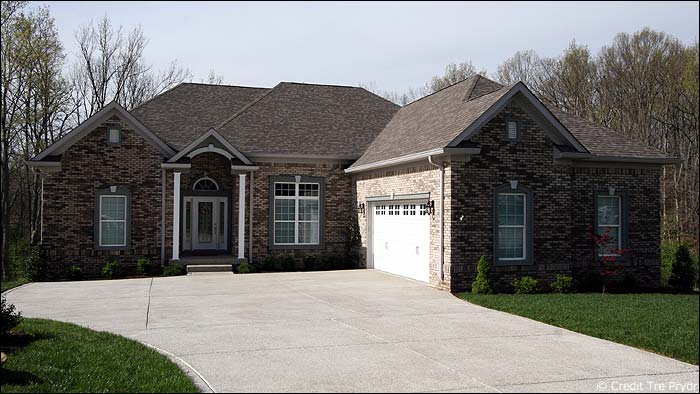 Photo of a new home with an attractive garage door