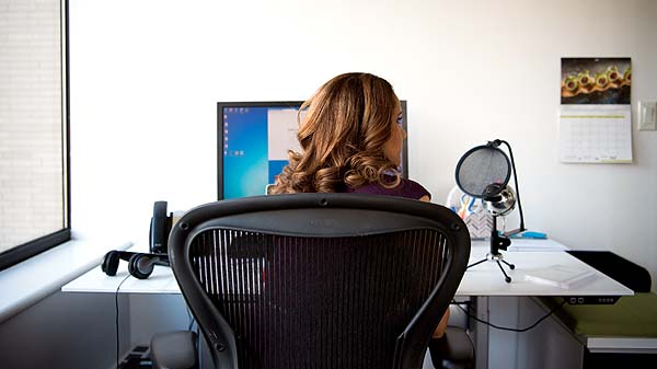 Photo of a woman sitting in a comfortable office chair