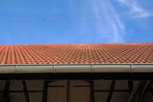 Photo of a tile roof with gutters