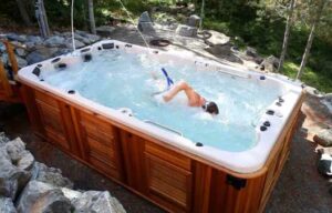 Photo of a man exercising in a hot tub