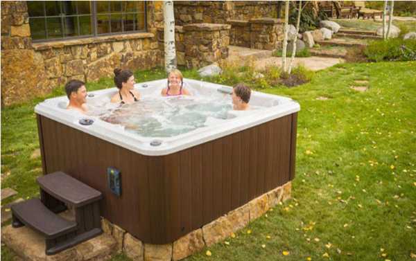 Photo of a family in their hot tub